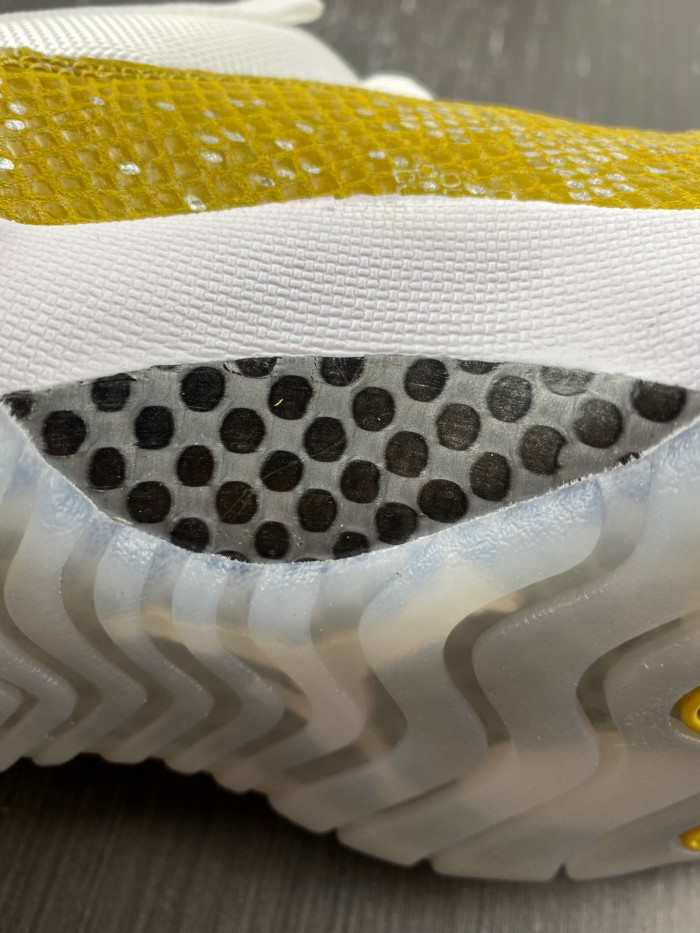 Air Jordan 11 Low WMNS “Yellow Snakeskin” AH7860-107.